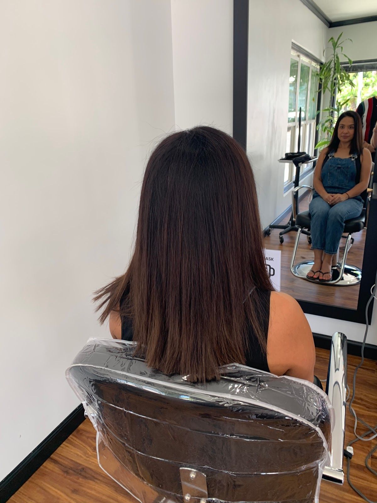 Long brunette hair color by Louis Tafolla in San Diego