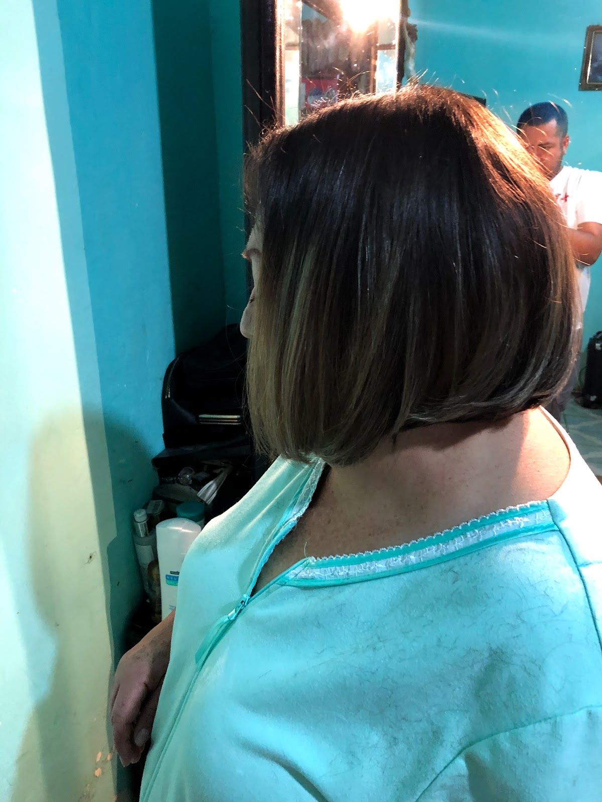 Sleek bob haircut by Louis Tafolla